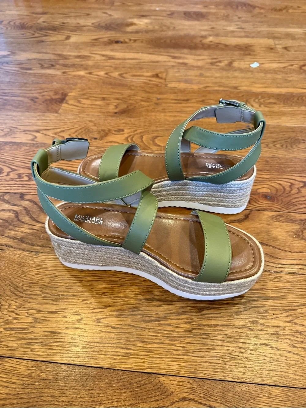 New, Unworn Michael Kors Lowry Wedge sandals in an oregano green color